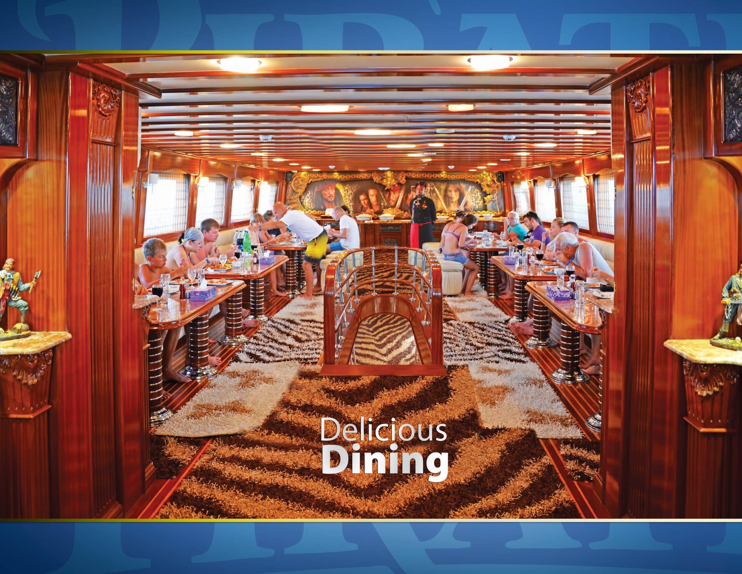06 Air-conditioned salon onboard the Pirates boat in Sharm El Sheikh, serving buffet lunch during the Red Sea cruise to Ras Mohammed.